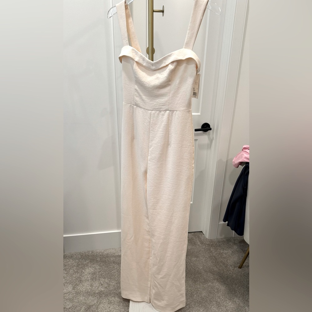 New with tags cream jumpsuit